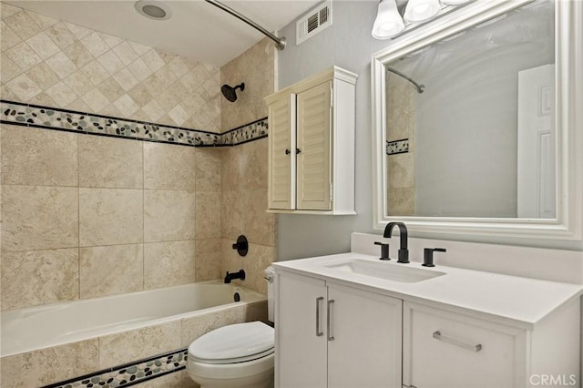 24540 Horst Dr, Crestline, CA 92325 - bathroom with visible vents, tiled shower / bath, toilet, and vanity