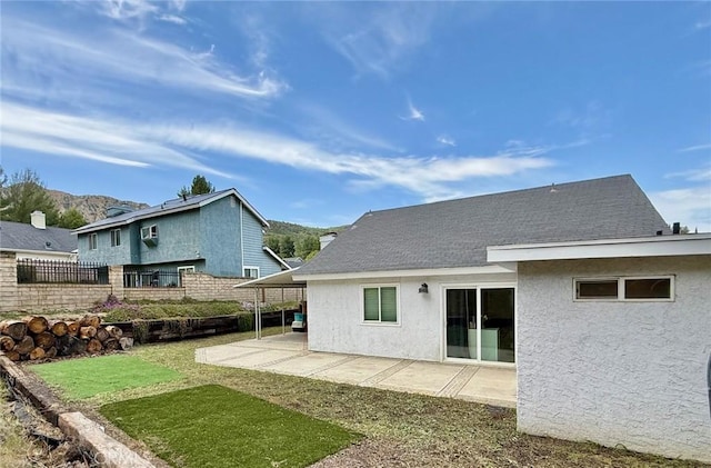 28236 Branch Rd, Castaic, CA 91384 - rear view of property with a lawn, a patio, fence, and stucco siding