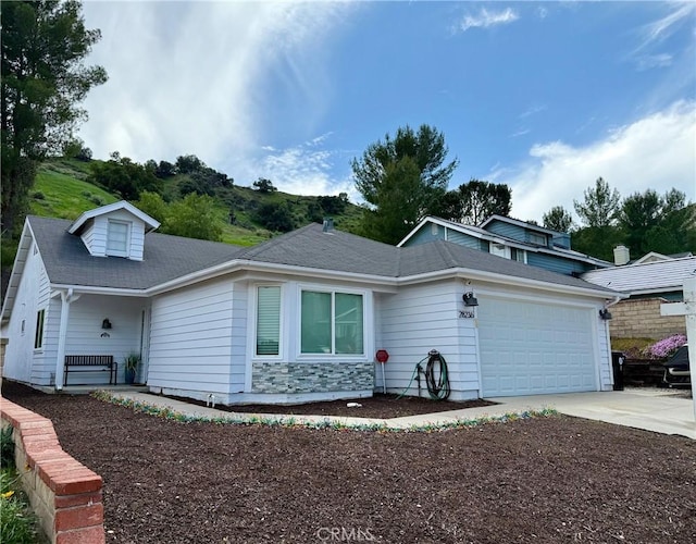 28236 Branch Rd, Castaic, CA 91384 - view of front facade featuring an attached garage, a shingled roof, and concrete driveway