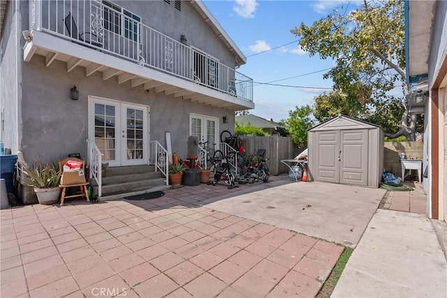 1435 W 50th St, Los Angeles, CA 90062 - view of patio with french doors and a balcony