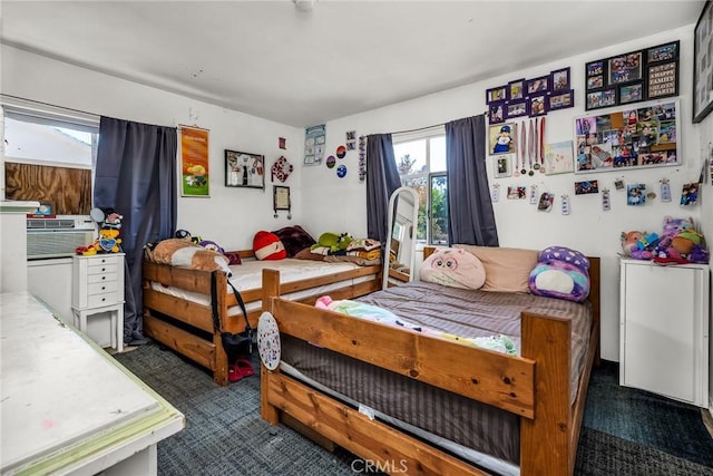 carpeted bedroom featuring cooling unit