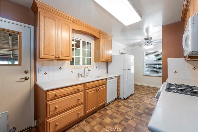 16230 Denley St, Hacienda Heights, CA 91745 - kitchen with a sink, white appliances, decorative backsplash, a ceiling fan, and light countertops