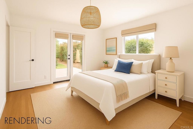 145 13th St, Del Mar, CA 92014 - bedroom with access to outside, multiple windows, and wood finished floors