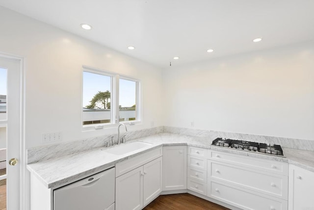 145 13th St, Del Mar, CA 92014 - kitchen with a sink, white dishwasher, stainless steel gas cooktop, dark wood-type flooring, and white cabinets