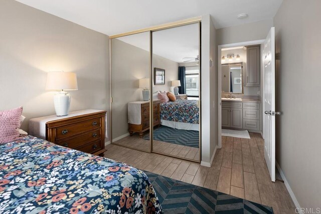 4007 Everts St Unit 4H, Pacific Beach San Diego, CA 92109 - bedroom featuring light wood-style flooring and a closet
