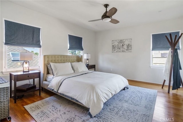 4368 Adams Ave, San Diego, CA 92116 - bedroom with multiple windows, wood finished floors, and a ceiling fan