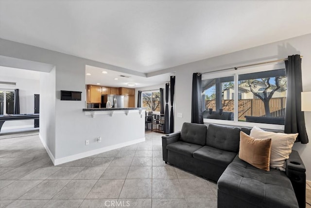 39878 Teal Dr, Murrieta, CA 92562 - living area with billiards, baseboards, recessed lighting, and light tile patterned floors