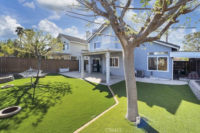 39878 Teal Dr, Murrieta, CA 92562 - back of house with stucco siding, a patio area, central AC unit, and fence