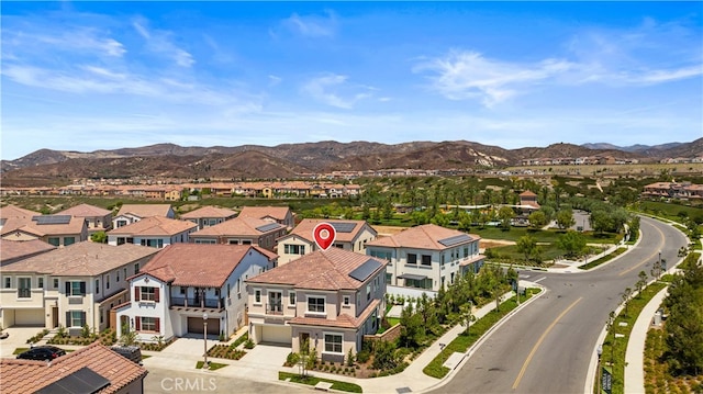 bird's eye view featuring a mountain view and a residential view