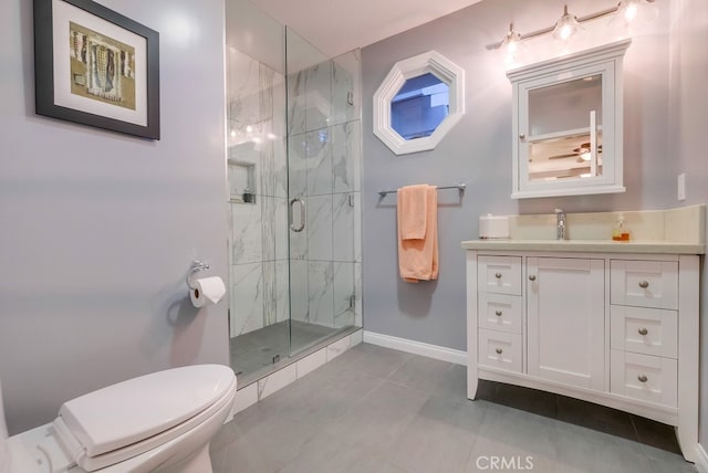 6217 Melba Ave, Woodland Hills, CA 91367 - full bathroom featuring toilet, a marble finish shower, vanity, baseboards, and tile patterned flooring