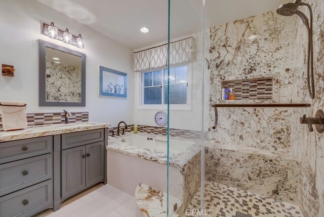 6217 Melba Ave, Woodland Hills, CA 91367 - full bathroom with a shower stall, vanity, a garden tub, tile patterned flooring, and recessed lighting