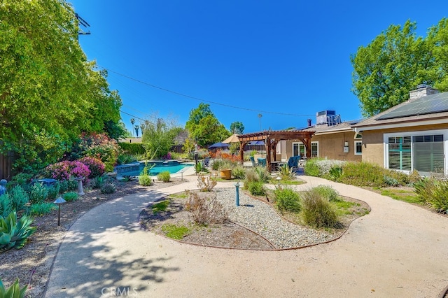 6217 Melba Ave, Woodland Hills, CA 91367 - view of yard featuring a pergola, a patio area, and an outdoor pool