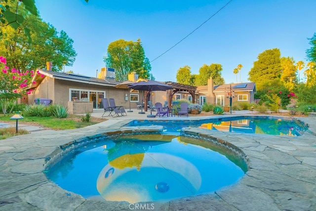 6217 Melba Ave, Woodland Hills, CA 91367 - view of swimming pool with a patio and a pool with connected hot tub