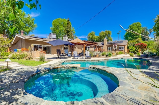 6217 Melba Ave, Woodland Hills, CA 91367 - view of swimming pool featuring a patio area and a pool with connected hot tub