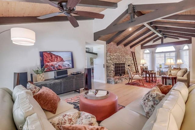 6217 Melba Ave, Woodland Hills, CA 91367 - living area featuring ceiling fan, wood finished floors, and a stone fireplace