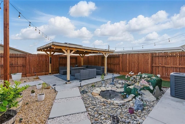 view of patio / terrace featuring a fenced backyard, an outdoor hangout area, and central air condition unit
