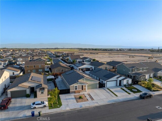 bird's eye view with a mountain view and a residential view