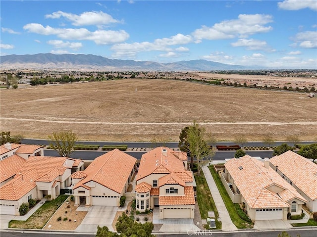 bird's eye view featuring a mountain view and a residential view