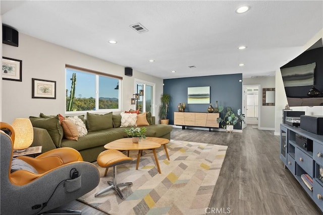 31725 Rancho Amigos Rd, Bonsall, CA 92003 - living area with recessed lighting, baseboards, wood finished floors, and visible vents