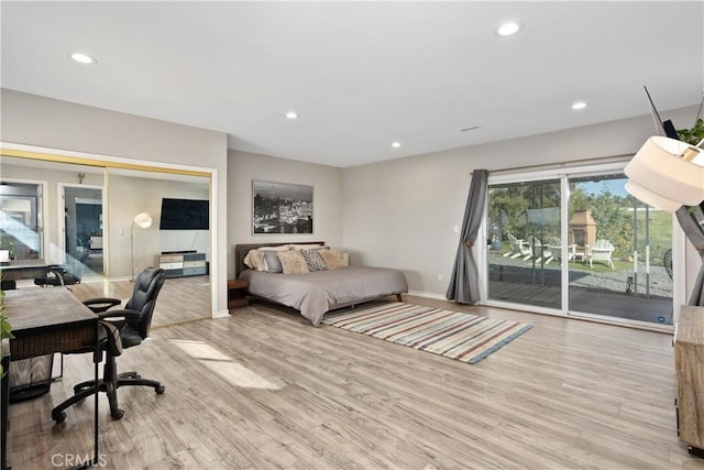 31725 Rancho Amigos Rd, Bonsall, CA 92003 - bedroom with recessed lighting, baseboards, access to exterior, and wood finished floors