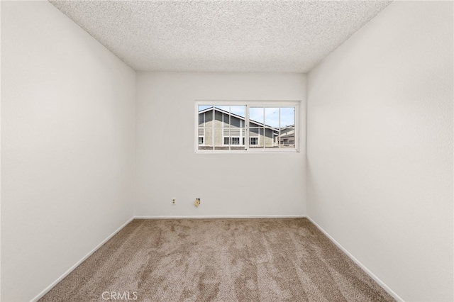 1144 N Lyman Ave, Covina, CA 91724 - carpeted spare room with a textured ceiling and baseboards