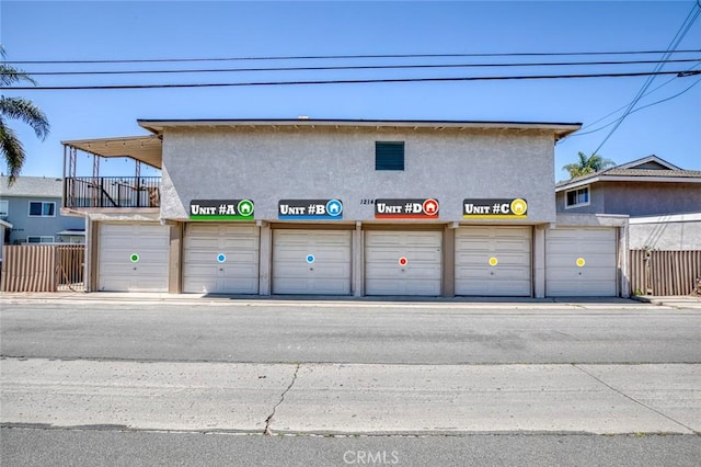 garage featuring fence