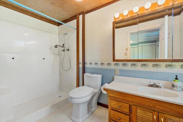 bathroom featuring vanity, a shower, toilet, tile patterned floors, and wallpapered walls