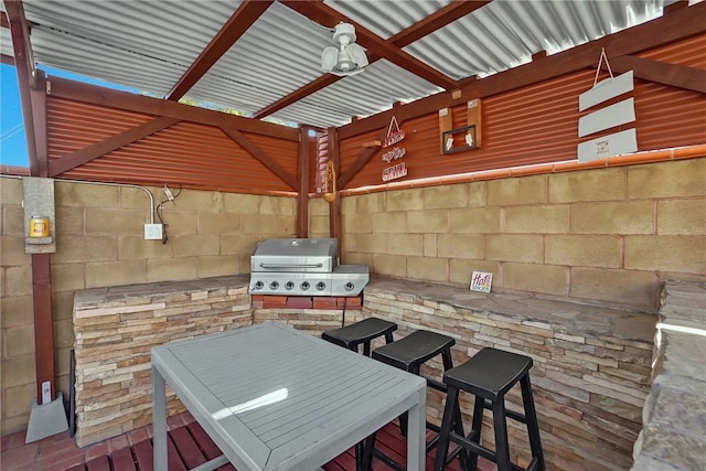 view of patio with a grill and area for grilling
