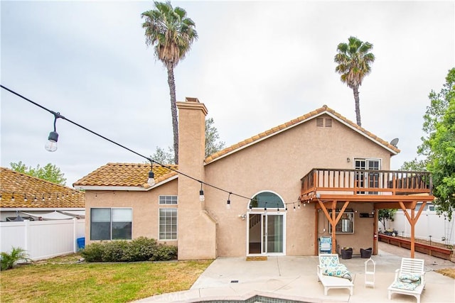 24356 Via Las Junitas, Murrieta, CA 92562 - rear view of property featuring a patio, fence, a deck, and stucco siding