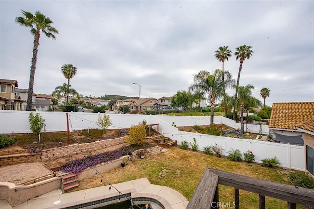 24356 Via Las Junitas, Murrieta, CA 92562 - view of yard with a fenced backyard and a residential view
