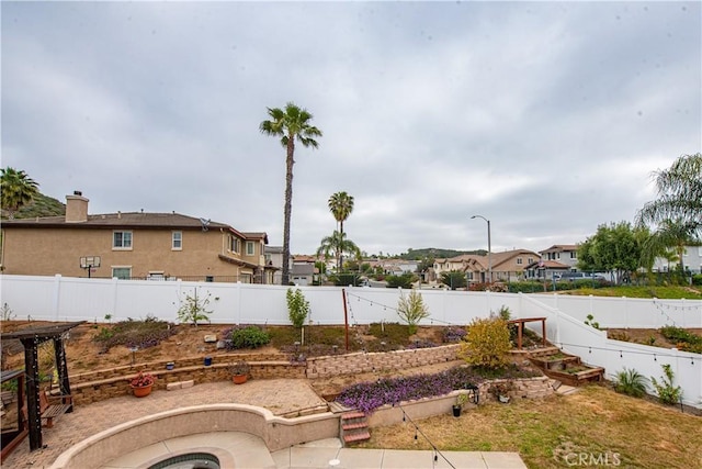 24356 Via Las Junitas, Murrieta, CA 92562 - view of yard with a fenced backyard, a vegetable garden, and a residential view