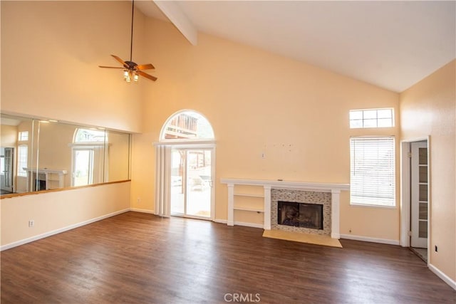 24356 Via Las Junitas, Murrieta, CA 92562 - unfurnished living room with high vaulted ceiling, ceiling fan, a fireplace, and dark wood-style floors