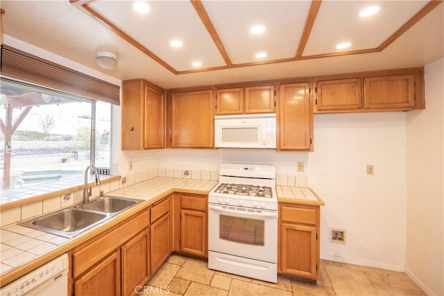 24356 Via Las Junitas, Murrieta, CA 92562 - kitchen featuring brown cabinetry, tile countertops, a sink, recessed lighting, and white appliances