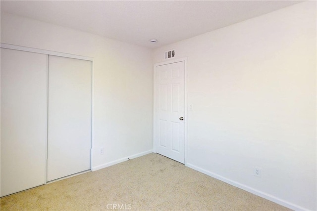 830 E Darlan St, Compton, CA 90220 - unfurnished bedroom featuring a closet, carpet, visible vents, and baseboards