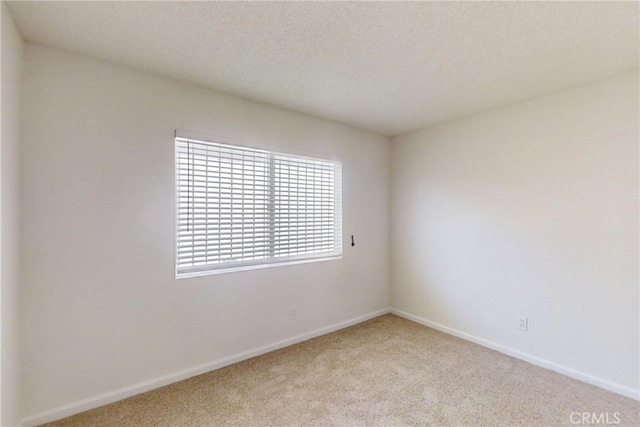 830 E Darlan St, Compton, CA 90220 - carpeted spare room featuring baseboards