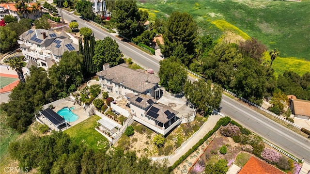 drone / aerial view of a pool