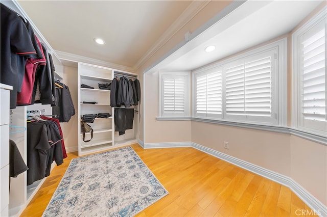 spacious closet with wood finished floors