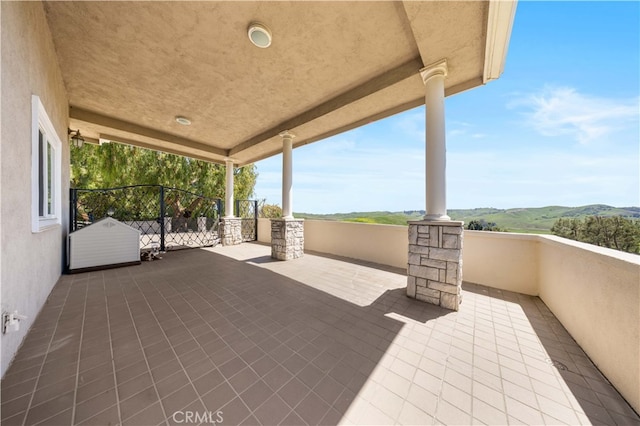 view of patio / terrace featuring a balcony