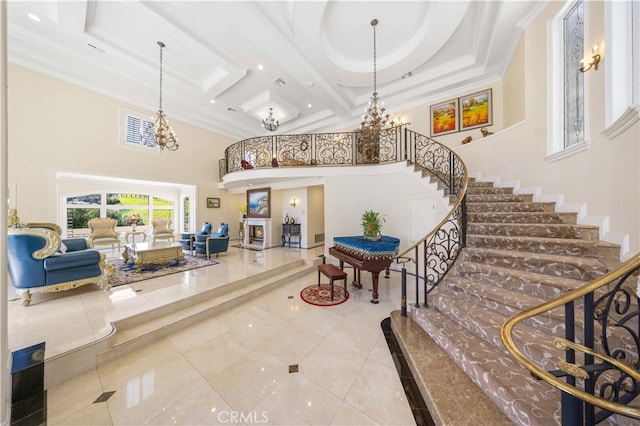 24106 Lodge Pole Rd, Diamond Bar, CA 91765 - entryway featuring a chandelier, a towering ceiling, stairs, tile patterned floors, and beam ceiling