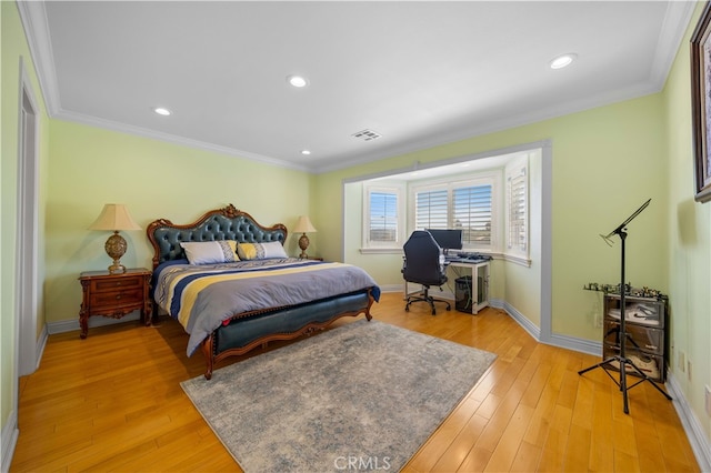 bedroom featuring ornamental molding, baseboards, light wood finished floors, recessed lighting, and an office area