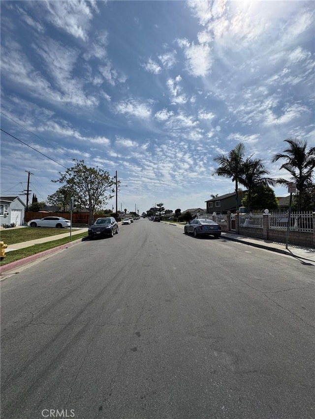 view of road featuring curbs and sidewalks