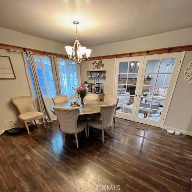 11406 Christy Ave, Sylmar, CA 91342 - dining room with a chandelier, french doors, and dark wood finished floors
