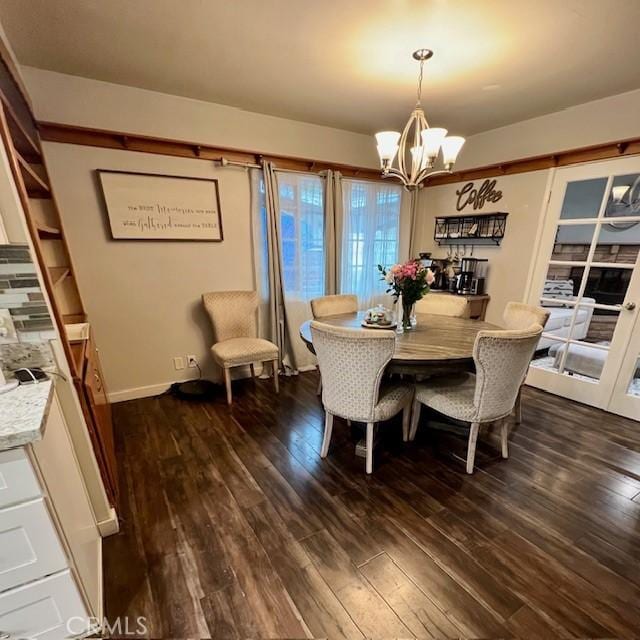 11406 Christy Ave, Sylmar, CA 91342 - dining space with a notable chandelier and dark wood-style flooring