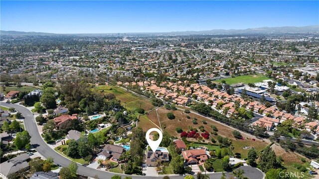 bird's eye view featuring a mountain view and a residential view