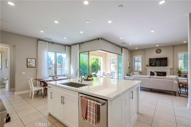 54 Rim Crst, Irvine, CA 92602 - kitchen with recessed lighting, light tile patterned floors, dishwasher, and a sink