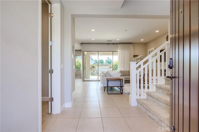 54 Rim Crst, Irvine, CA 92602 - foyer with light tile patterned flooring, baseboards, recessed lighting, and stairs