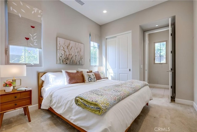 54 Rim Crst, Irvine, CA 92602 - bedroom with a closet, light colored carpet, visible vents, recessed lighting, and baseboards