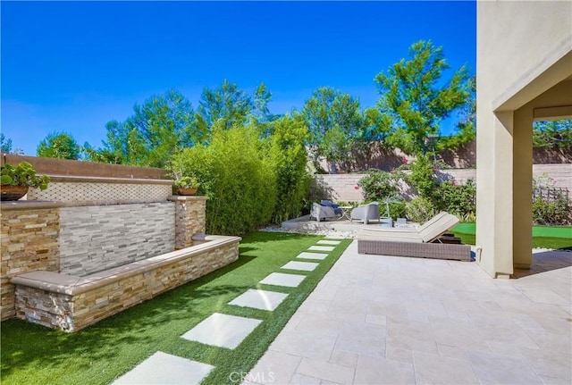 54 Rim Crst, Irvine, CA 92602 - view of yard featuring a patio and a fenced backyard