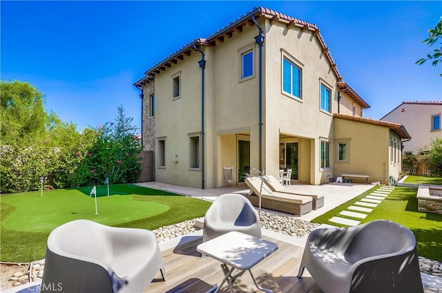 54 Rim Crst, Irvine, CA 92602 - rear view of house with a patio area, stucco siding, and fence private yard