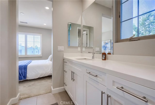 54 Rim Crst, Irvine, CA 92602 - bathroom featuring vanity, baseboards, tile patterned flooring, ensuite bathroom, and visible vents